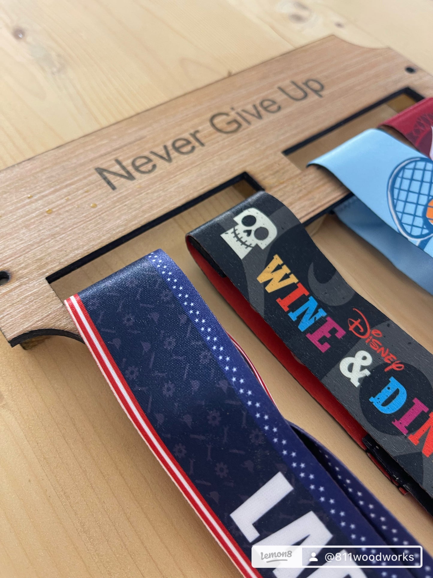 Never give up. Wooden race medal hanger/holder