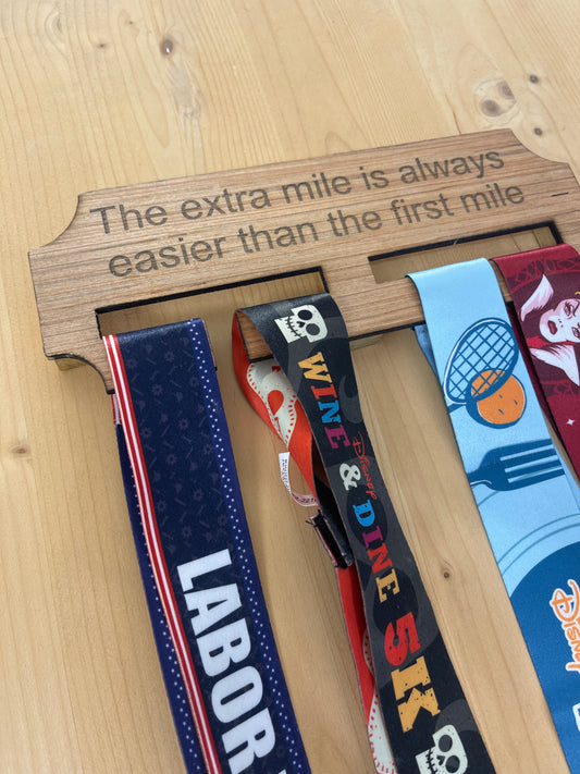 The extra mile wooden race medal hanger/holder