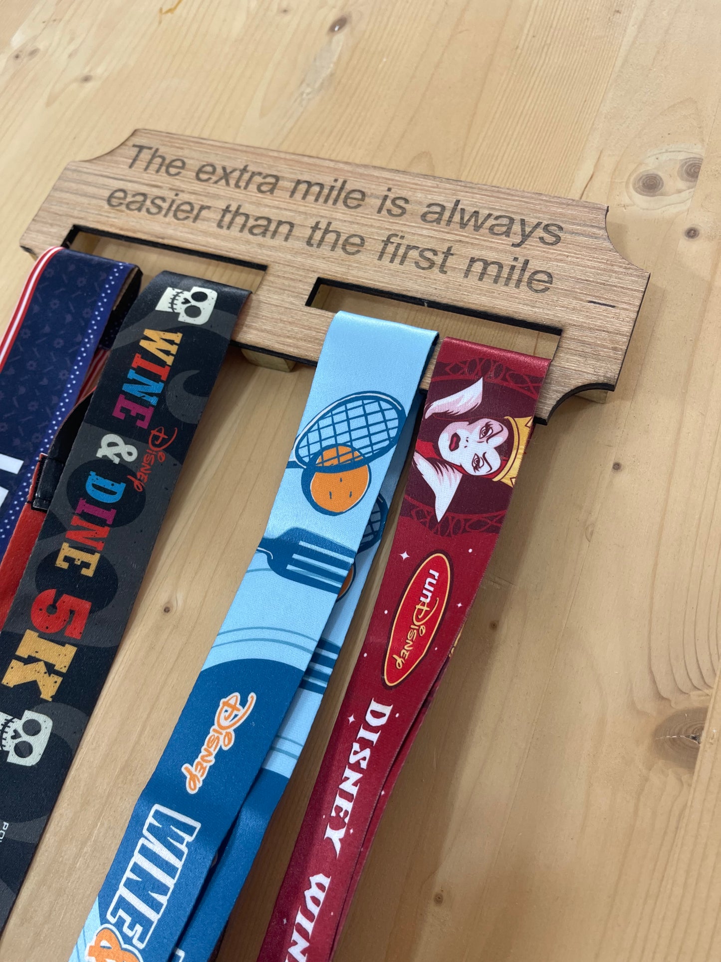 The extra mile wooden race medal hanger/holder