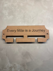 Every mile is a journey. Wooden race medal hanger/holder