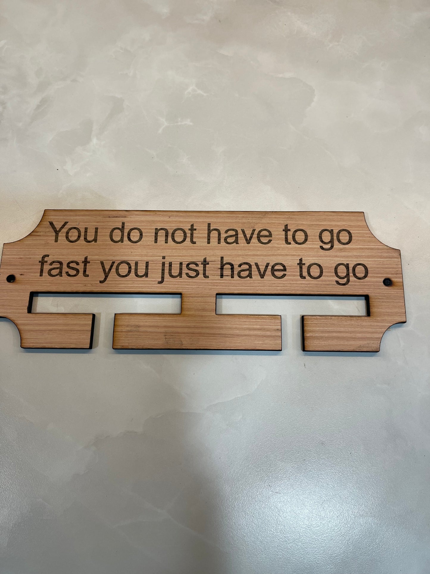 Never give up. Wooden race medal hanger/holder